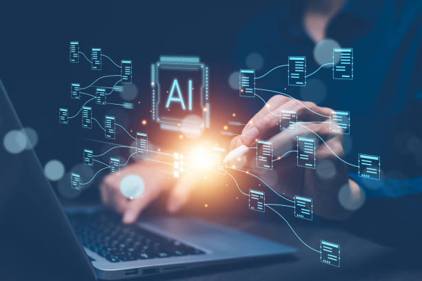 برنامه‌نویسان در حال کار با لپ‌تاپ‌ها و نرم‌افزارهای هوش مصنوعی