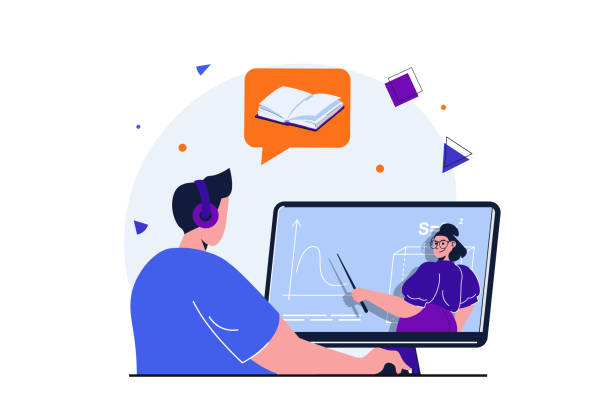 دانشجوی جوان در حال تماشای ویدیوی آموزشی با هدفون - تجربه یادگیری دیجیتال مدرن