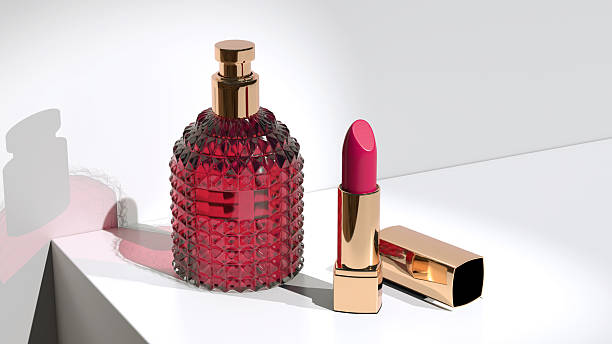 بطری عطر و رژ لب لوکس، نمادی از برندینگ دیجیتال و طراحی سایت فروشگاههای عطر در کیش