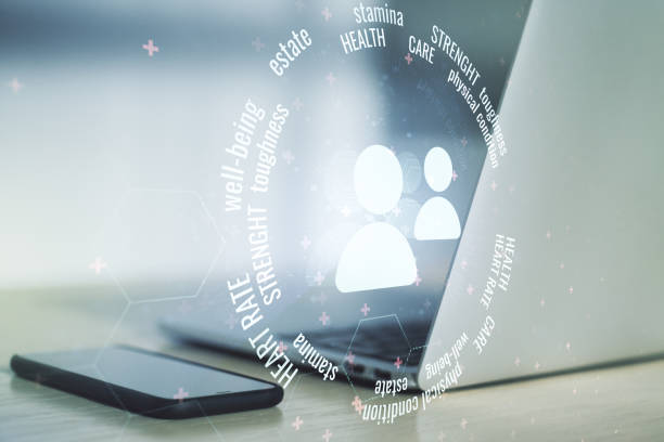 طراحی UX بیماران برای مراکز سالمندان در قزوین - لپتاپ مدرن با نمادهای سلامت و زندگی برای پشتیبانی دیجیتال سلامت